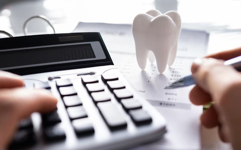 dental-insurance-money dentist service desk implant money