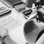 woman checking reports and receipts